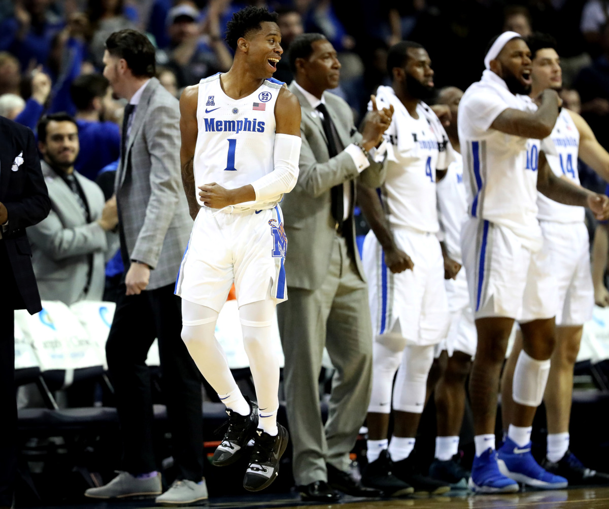 <strong>University of Memphis guard Tyler Harris (1) celebrates after a teammate dunks as basket in a game against the Little Rock Trojans. The Tigers beat the Trojans 99-89 on Wednesday, Dec. 19, 2018, at FedExForum in Memphis.</strong> (Houston Cofield/Daily Memphian)