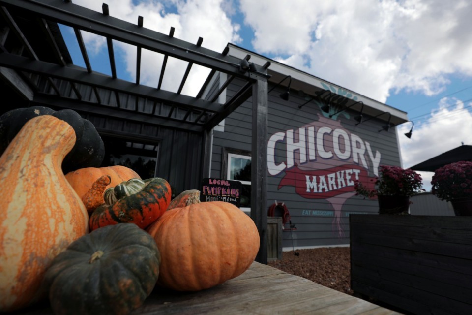 <strong>Autumnal decorative pumpkins sit outside of Chicory Market in Oxford, Mississippi, Oct. 20, 2020.</strong> (Patrick Lantrip/Daily Memphain)