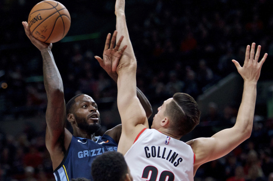 <strong>Memphis Grizzlies forward JaMychal Green (left) shoots over Portland Trail Blazers forward Zach Collins during the first half of an NBA game in Portland, Ore., Wednesday, Dec. 19, 2018.</strong> (AP Photo/Craig Mitchelldyer)