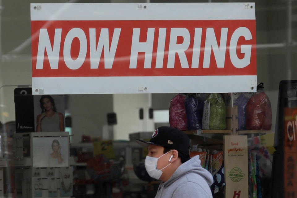 <strong>On Thursday, Oct. 22, the number of Americans seeking unemployment benefits fell to 787,000, a sign that job losses may have eased slightly.</strong> (Jeff Chiu/AP file)