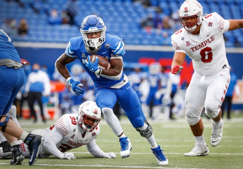<strong>Memphis running back Rodrigues Clark (left) runs past the Temple defense for a touchdown during action on Saturday, Oct. 24, 2020 at Liberty Bowl Memorial Stadium.</strong> (Mark Weber/The Daily Memphian)