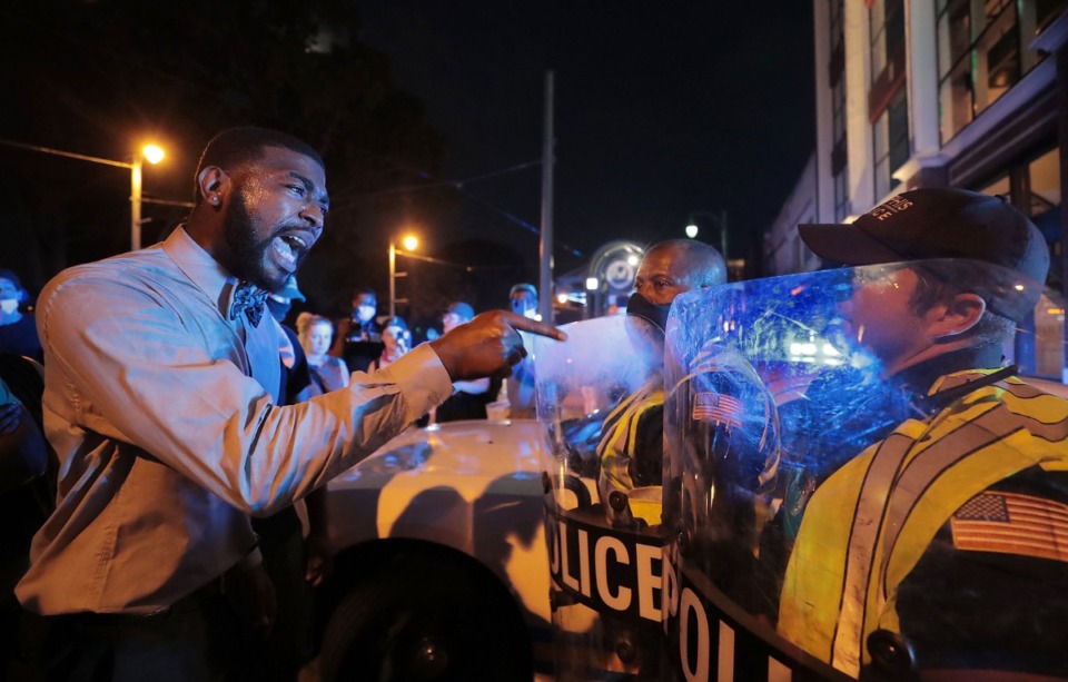 <strong>Darin Abston Jr. with the Memphis People Coalition demands an apology from a Memphis police officer during a June protest.</strong> (Patrick Lantrip/Daily Memphian file)