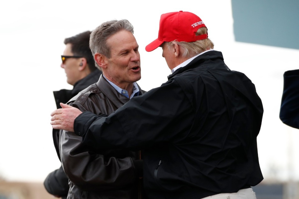 <strong>Tennessee Gov. Bill Lee greeted President Donald Trump on March 6, 2020, at Berry Field Air National Guard Base in Nashville. The president traveled to Tennessee to survey tornado damage.</strong> (Alex Brandon/Associated Press file)