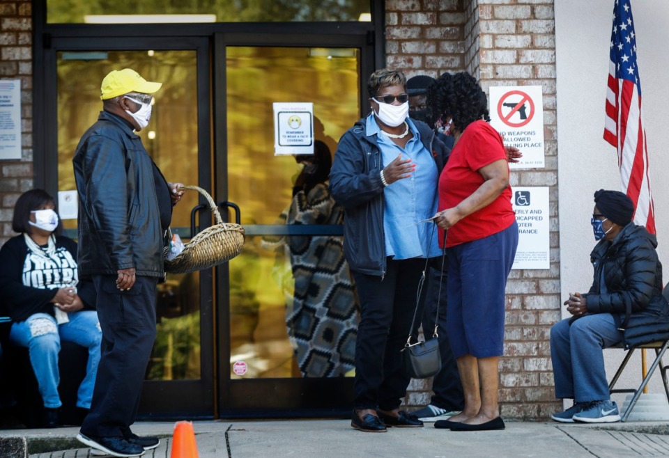 <strong>Poll workers greet voters at Christ Missionary Baptist Church on Tuesday, Nov. 3, 2020 on South Parkway East.</strong> (Mark Weber/The Daily Memphian)