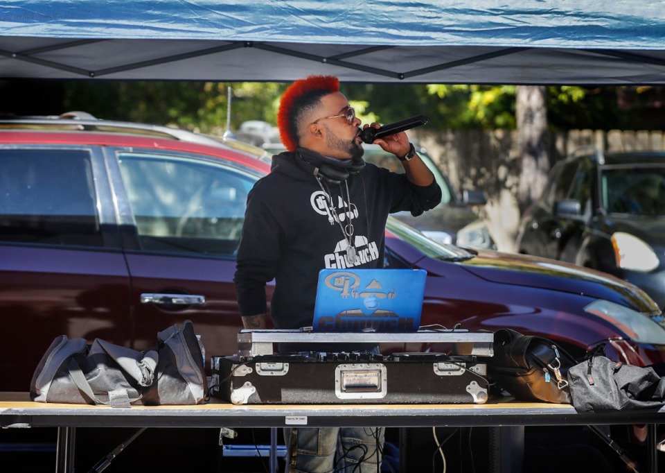 <strong>D.J. Chuuuch plays tunes in the parking at Christ Missionary Baptist Church on Tuesday, Nov. 3, 2020 on South Parkway East.</strong> (Mark Weber/The Daily Memphian)