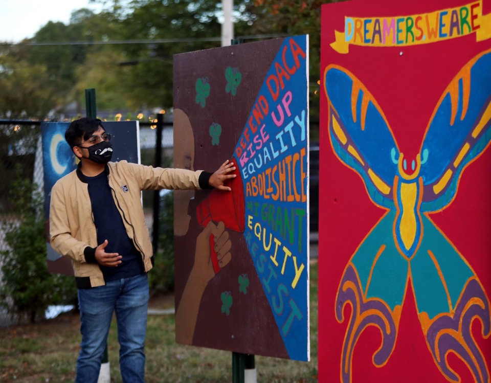 <strong>Jorge Chamorro explains some of the meaning behind an art installation in front of First Congregational Church Nov. 4, 2020.</strong> (Patrick Lantrip/Daily Memphian)