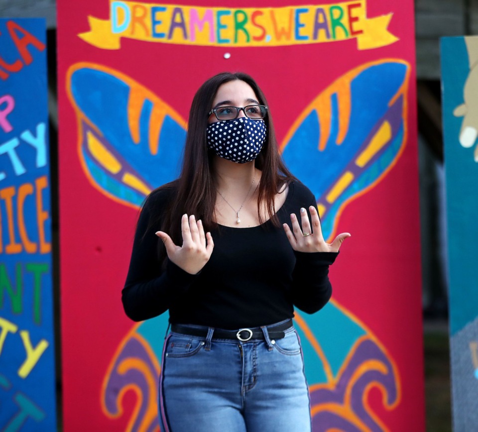 <strong>Lucero Amador speaks during the unveiling of a new art installation in front of First Congregational Church that aims to raise awareness for the struggles many immigrants face when coming to America</strong>. (Patrick Lantrip/Daily Memphian)