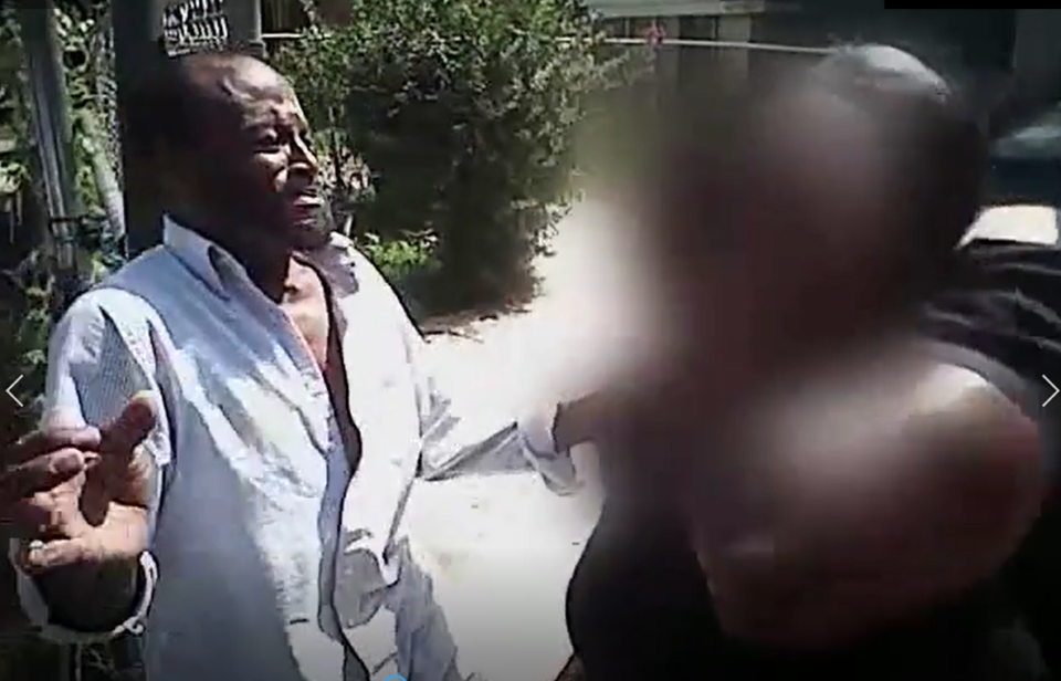 <strong>In this freeze frame from police body camera footage, Memphis Police officer Enis Jackson&rsquo;s elbow is seen in the foreground as he slips his left arm under a teenage girl&rsquo;s chin. Police censors obscured the girl&rsquo;s face.</strong> (Submitted)