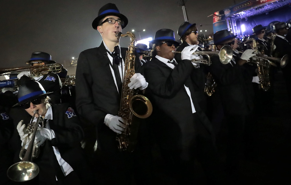 <strong>The Mighty Sound of the South performs at a University of Memphis pep rally Friday, Dec. 21, in the Uptown area of Birmingham. Saturday's Birmingham Bowl marks the Tigers' fifth-straight bowl appearance, setting a program record.</strong> (Jim Weber/Daily Memphian)