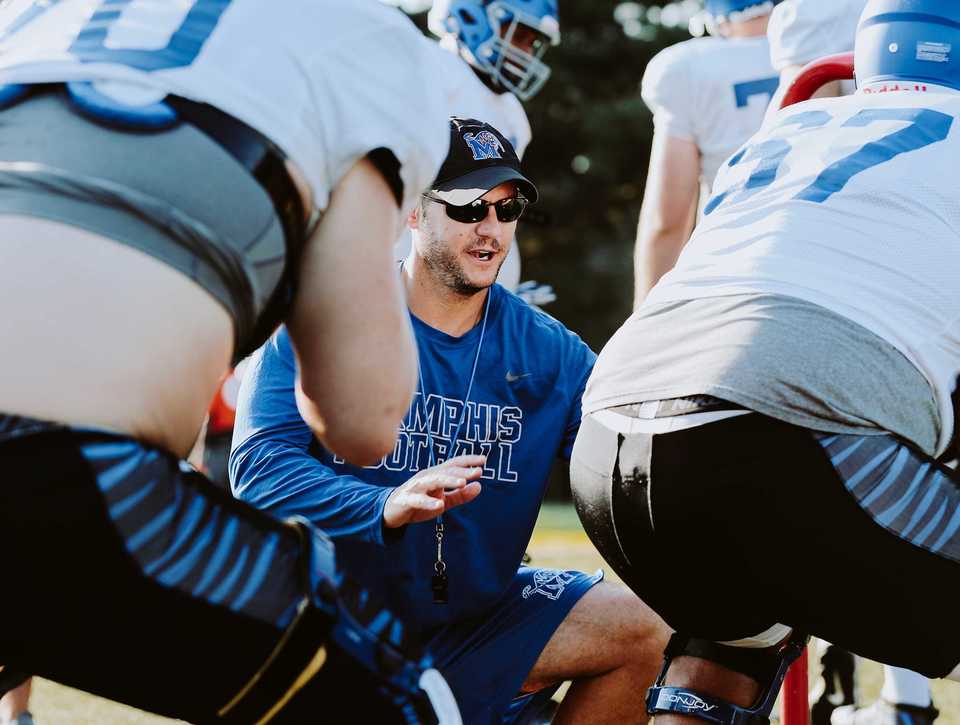 <strong>Memphis Tigers' offensive line coach Ryan Silverfield works with his players during practice at the Tigers south campus. Silverfield said working with head coach Mike Norvell and his staff is the best opportunity.&nbsp;&ldquo;I&rsquo;m so fortunate. I have the best job in the world.&rdquo;</strong> (Houston Cofield/Daily Memphian)