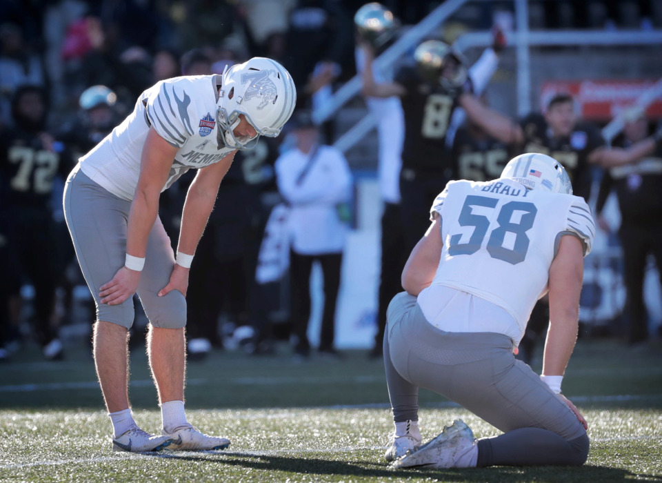 <strong>University of Memphis kicker Riley Patterson (left) reacts after missing a field goal attempt to tie the game against Wake Forest during the Birmingham Bowl on Dec. 22, 2018, at Legion Field in Birmingham, Ala.</strong> (Jim Weber/Daily Memphian)