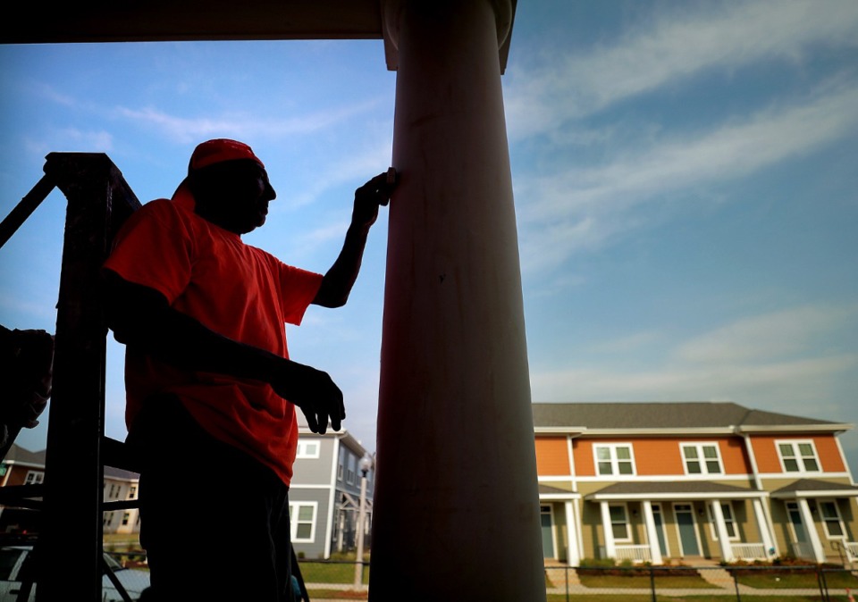 <strong>The South City development (where a workman sands a column in a 2019 file photo) is part of Memphis&rsquo; effort to bring racial and economic diversity into areas that suffered due to old segregation laws.</strong> (Jim Weber/Daily Memphian file )