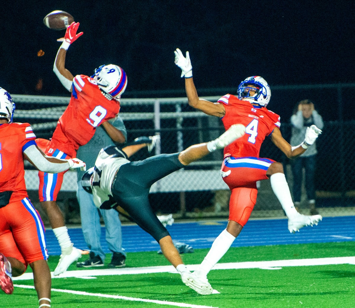 <strong>Bartlett High School safety Thomas Jones (9) and safety Marcio Smith (4) break up a pass to Houston High School receiver Alex Desarzant in the district playoff Saturday, Nov. 14, 2020.</strong> (Greg Campbell/Special to The Daily Memphian)