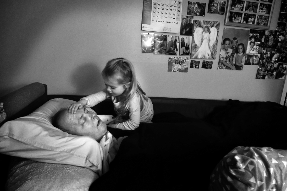 <strong>Two years after his diagnosis, Bob Bolding's granddaughter routinely climbs into bed with him wanting to be close. The simple things give Bob comfort and joy throughout his illness: being surrounded by kids, dogs, music and faith.</strong> (Karen Pulfer Focht/Special to The Daily Memphian)