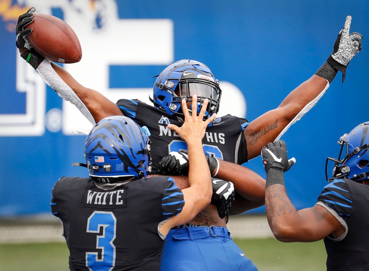 <strong>Memphis running back Marquavius Weaver (middle) celebrates a rushing touchdown during action against Stephen F. Austin on Saturday, Nov. 21, 2020.</strong> (Mark Weber/The Daily Memphian)