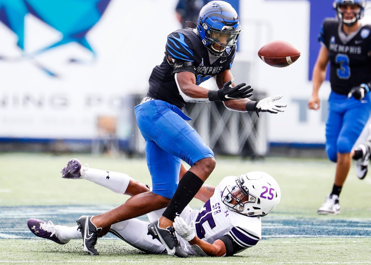 <strong>Memphis receiver Javon Ivory can&rsquo;t hang on to a catch while being hit by Stephen F. Austin defender Tkai Lloyd during action on Saturday, Nov. 21, 2020.</strong> (Mark Weber/The Daily Memphian)