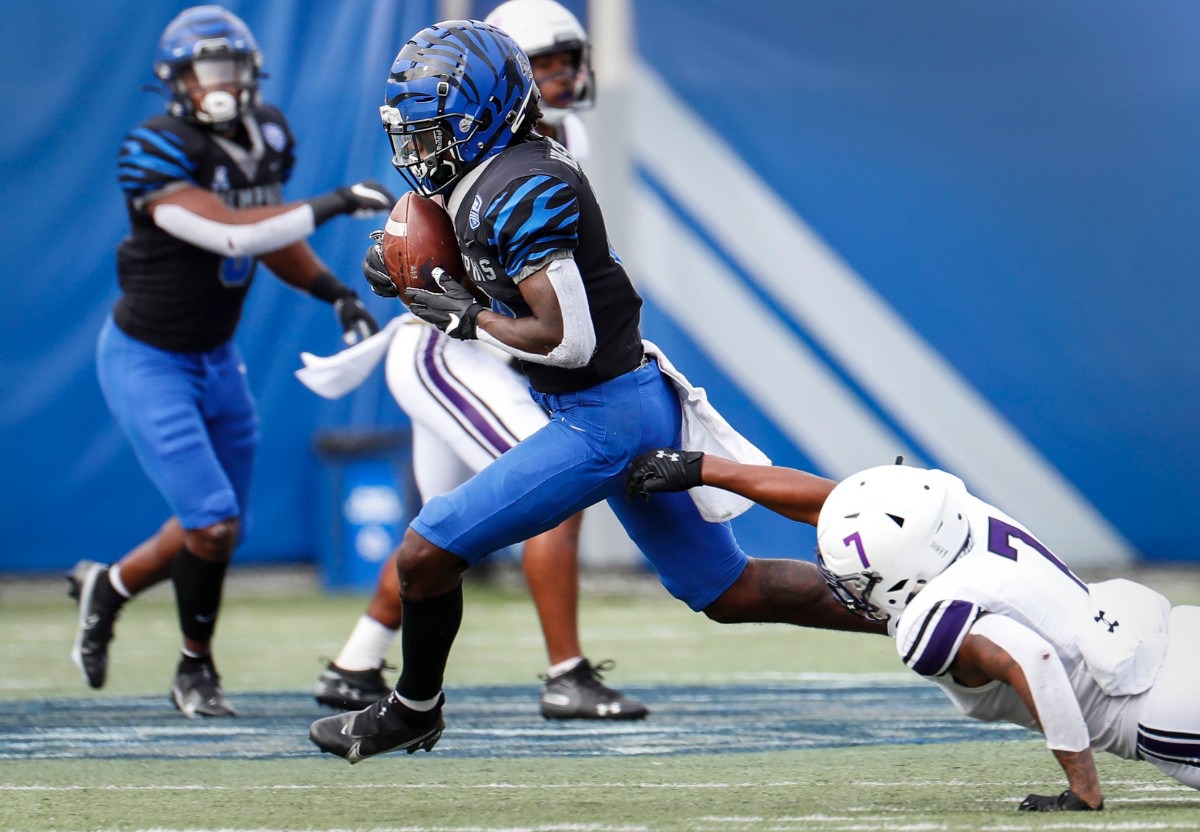 <strong>Memphis receiver Tahj Washington (left) runs by Stephen F. Austin defender Jeremiah Davis (right) on his way to a touchdown during action on Saturday, Nov. 21, 2020.</strong> (Mark Weber/The Daily Memphian)
