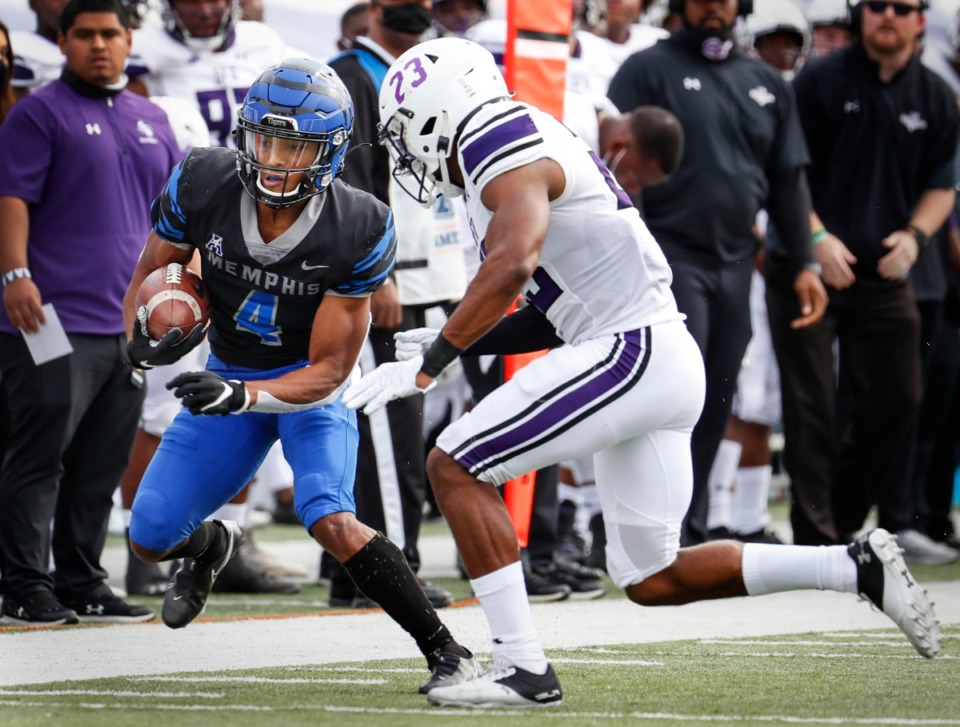 <strong>Memphis receiver Calvin Austin III (left) makes a first down catch against Stephen F. Austin defender Bruce Harmon (right) during action on Saturday, Nov. 21, 2020.</strong> (Mark Weber/The Daily Memphian)