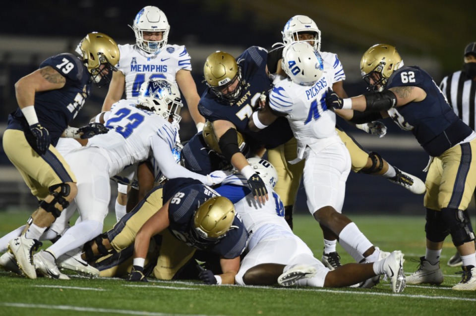 <strong>Defensive lineman Morris Joseph (10) delivers a sack against Navy in the game Saturday, Nov. 28, 2020 in Annapolis, MD.</strong> (Carolyn Andros/University of Memphis)
