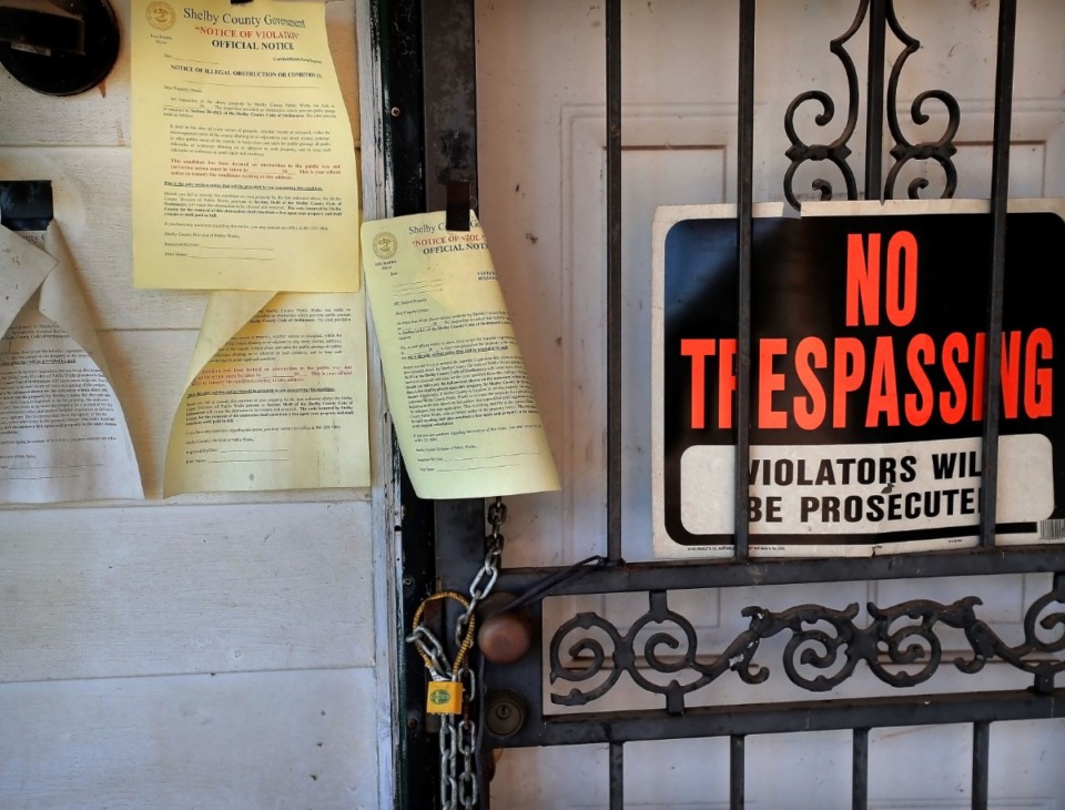 <strong>Several eviction notices litter the front porch of a vacant blighted home in Northaven in 2019. The pandemic has made eviction a national controversy.</strong> (Jim Weber/Daily Memphian file)