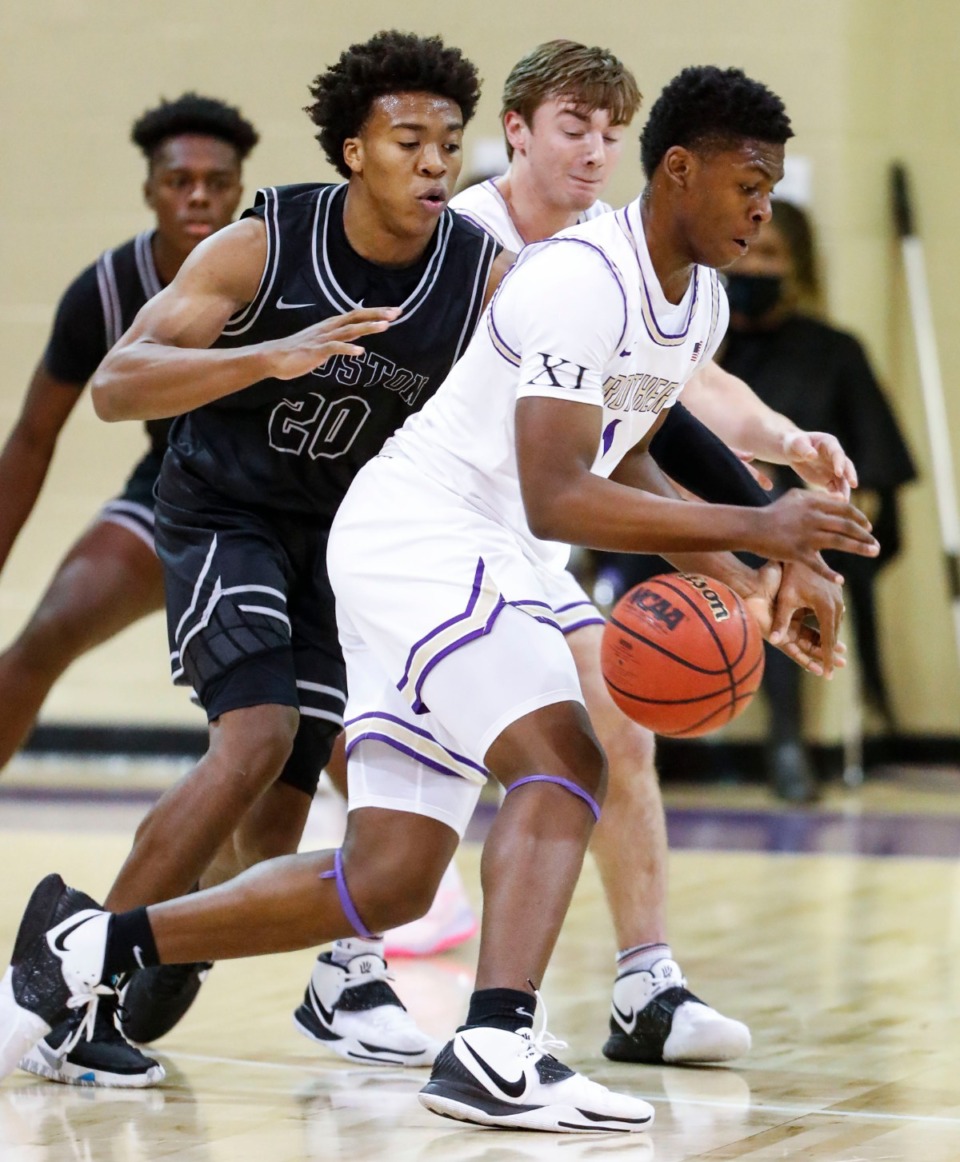 <strong>CBHS guard Reese McMullen (right) is fouled by Houston&rsquo;s T.J. Matlock (left) on Dec. 1, 2020.</strong> (Mark Weber/The Daily Memphian)