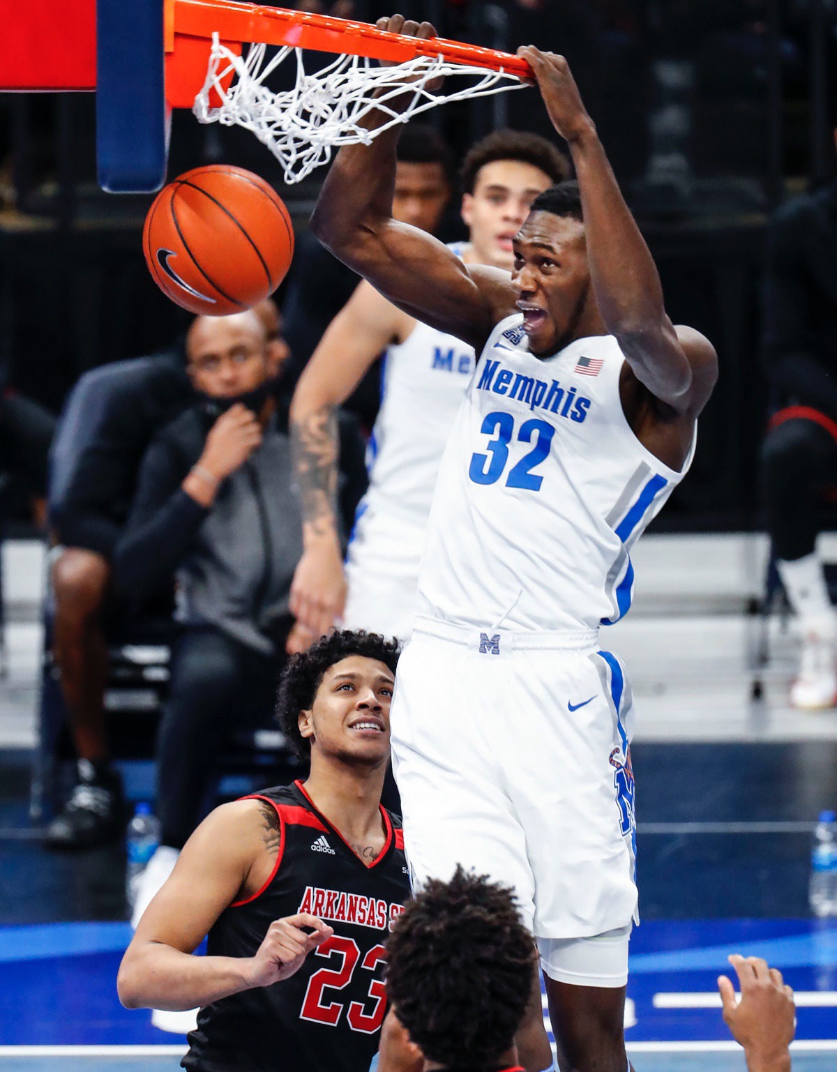 <strong>Memphis center Moussa Cisse (top) dunks over the Arkansas State defense on Dec. 2, 2020.</strong> (Mark Weber/The Daily Memphian)