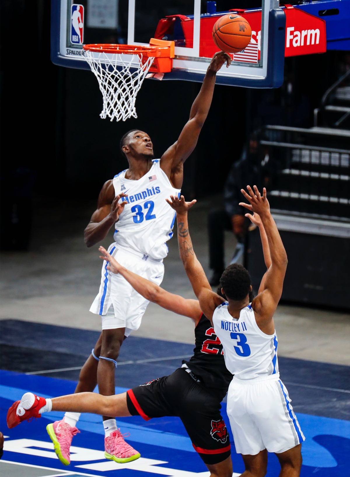 <strong>Memphis center Moussa Cisse (left) blocks the shot of Arkansas State guard Marquis Eaton on Dec. 2, 2020.</strong> (Mark Weber/The Daily Memphian)