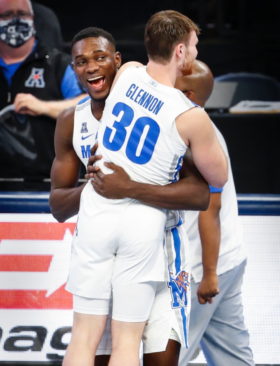 <strong>Memphis center Moussa Cisse (left) celebrates with teammate Conor Glennon after defeating Arkansas State 83-54 on Wednesday, Dec. 2, 2020.</strong> (Mark Weber/The Daily Memphian)