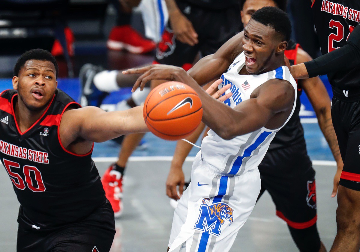 <strong>Memphis center Moussa Cisse (right) battles Arkansas State&rsquo;s Antwon Jackson (left) for a rebound.</strong> (Mark Weber/The Daily Memphian)