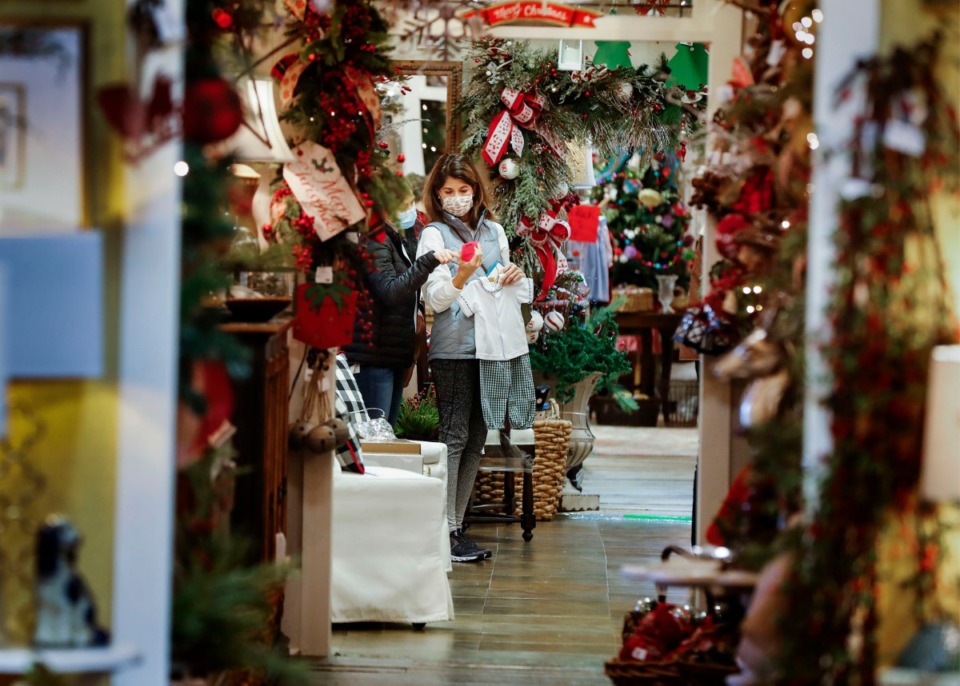 <strong>Customers at Charlene's browse knickknacks among the holiday decorations.</strong> (Mark Weber/Daily Memphian)