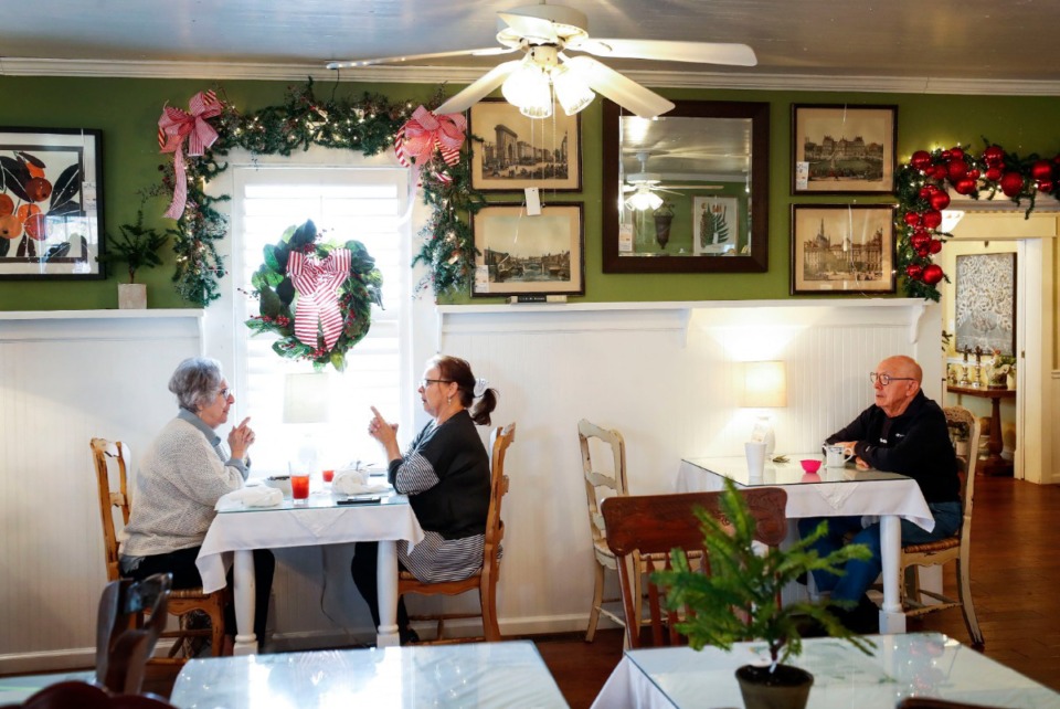 <strong>Customers enjoy lunch at the Just Divine Tea Room at Charlene&rsquo;s Colony in Halls, Tenn. &ldquo;I had to have a place for people to eat because it&rsquo;s not like there&rsquo;s a lot around here, and we needed something,&rdquo; said owner Charlene Roberts.</strong> (Mark Weber/Daily Memphian)