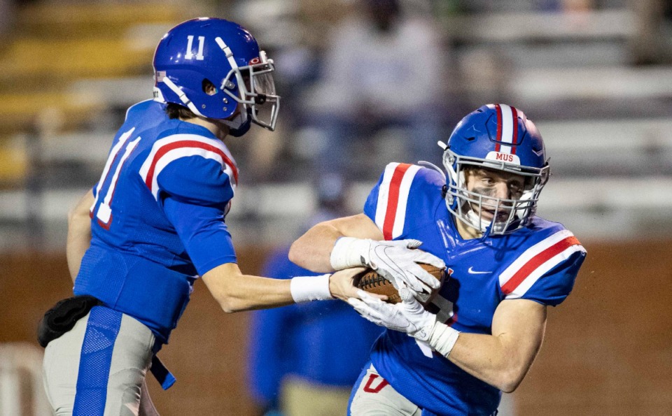 <strong>MUS quarterback Edwin Shy (11) hands the ball off to Christopher Goodwin in the game against McCallie, Thursday, Dec. 3, 2020, in Cookeville, Tennessee.</strong> (Wade Payne/www.wadepaynephoto.com)