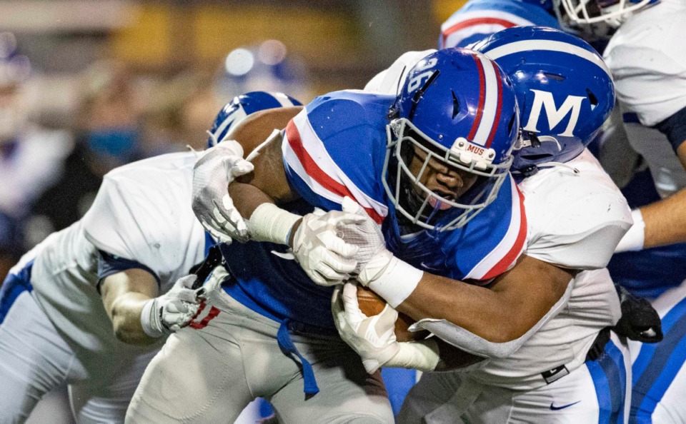 <strong>MUS running back Hunter Barnes is tackled by a McCallie player as he runs for yardage on Dec. 3, 2020, in Cookeville, Tennessee.</strong> (Wade Payne/www.wadepaynephoto.com)