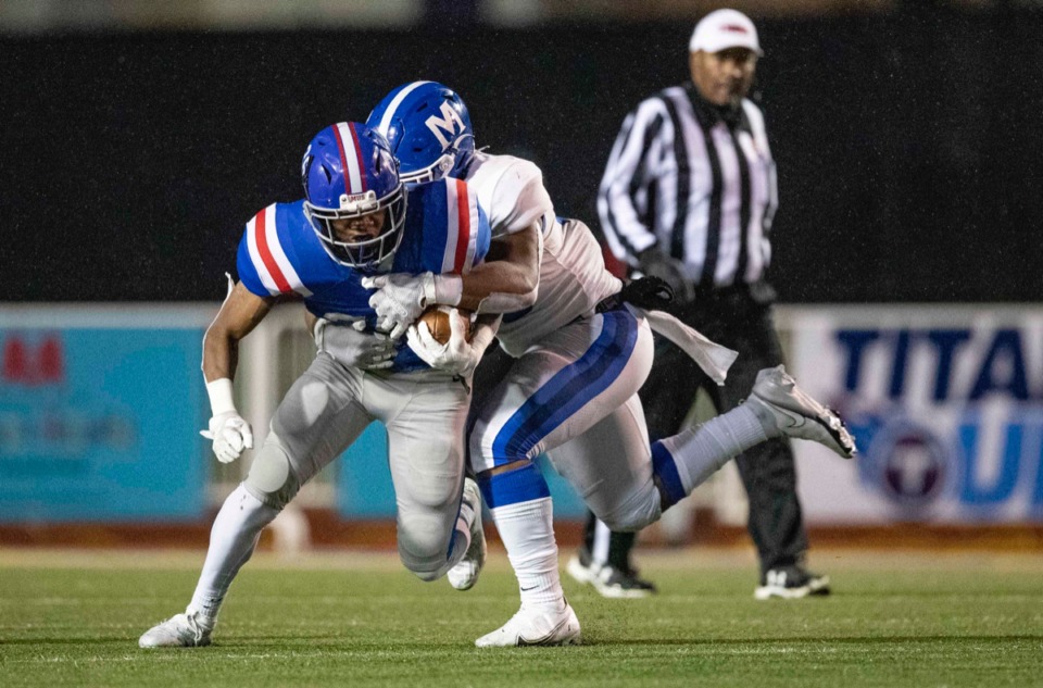 <strong>MUS running back Hunter Barnes is tackled in the game against McCallie Thursday, Dec. 3, 2020, in Cookeville, Tennessee.</strong> (Wade Payne/www.wadepaynephoto.com)