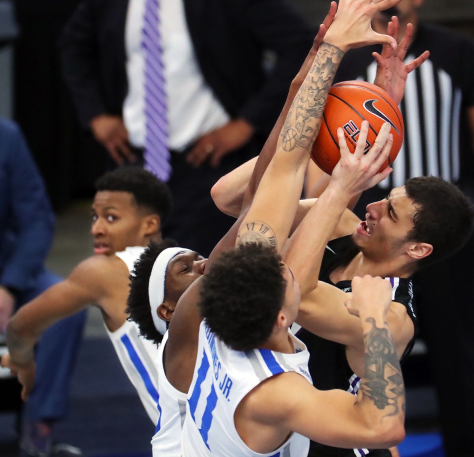 <strong>University of Memphis guard Lester Quinones (11) tries to stop a layup during the Dec. 4, 2020, game against the University of Central Arkansas.</strong> (Patrick Lantrip/Daily Memphian)