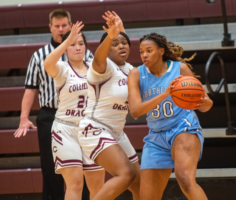 <strong>Northpoint&rsquo;s Leah Jones (30) is heavily guarded by Collierville High School's Lauren Robinson (32) and Miranda Pham (20) at Collierville High School.</strong> (Greg Campbell/Special to The Daily Memphian)
