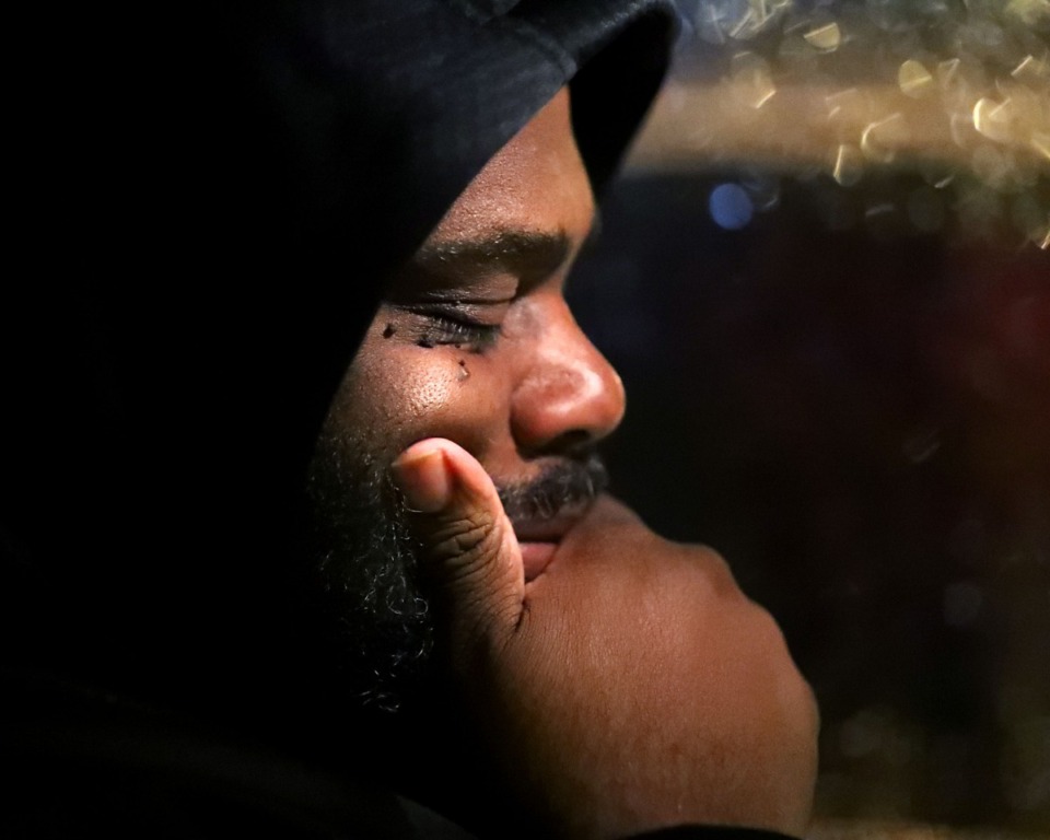 <strong>Darrell Cobbins reflects in his car outside of the Baptist Memorial Hospital emergency room where his brother, Donnell, died from COVID-19 earlier in the day Dec. 11, 2020.</strong> (Patrick Lantrip/Daily Memphian)