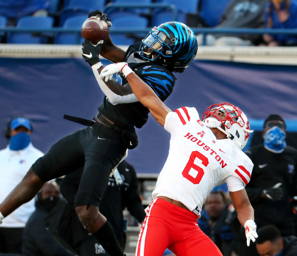 <strong>University of Memphis wide receiver Tahj Washington goes up for a catch during a Dec. 12, 2020 game against the University of Houston.</strong> (Patrick Lantrip/Daily Memphian)