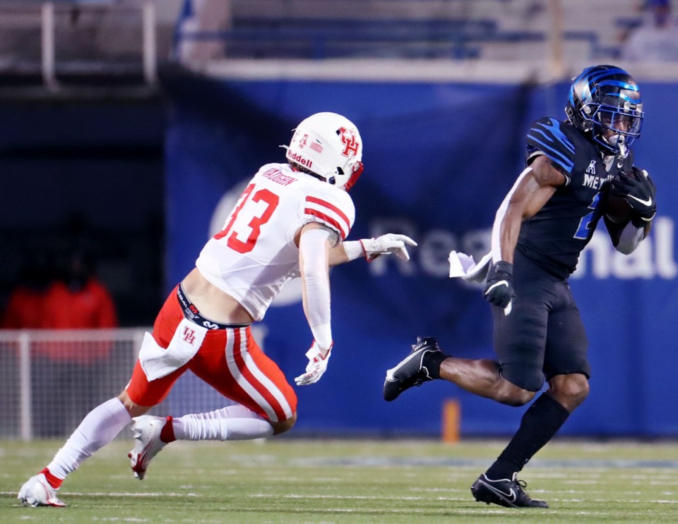<strong>University of Memphis running back Rodrigues Clark (2) tries to evade a defender during a Dec. 12, 2020 game against the University of Houston.</strong> (Patrick Lantrip/Daily Memphian)