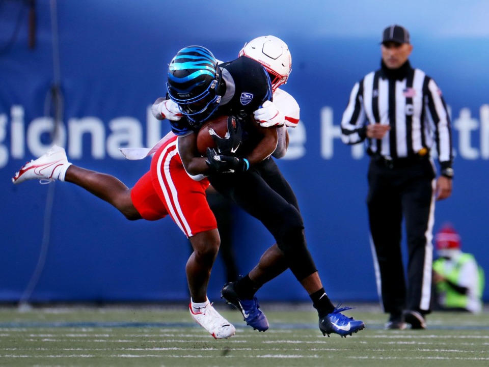 <strong>University of Memphis wide receiver Kylan Watkins (17) gets brought down during a Dec. 12, 2020 game against the University of Houston.</strong> (Patrick Lantrip/Daily Memphian)