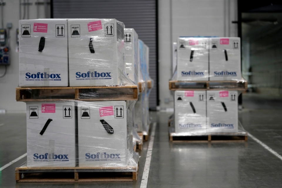 <strong>Boxes containing the Pfizer-BioNTech COVID-19 vaccine arrived in Memphis Sunday, Dec. 13. They were transported from Pfizer Global Supply Kalamazoo manufacturing plant in Portage, Mich.</strong> (Morry Gash/AP)