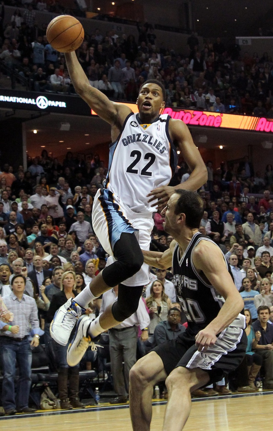 <strong>Memphis Grizzlies forward Rudy Gay goes to the basket over San Antonio Spurs guard Manu Ginobili, in a game on Jan. 11, 2013, in Memphis. Memphis won in overtime 101-98.</strong> (AP Photo/Lance Murphey file)