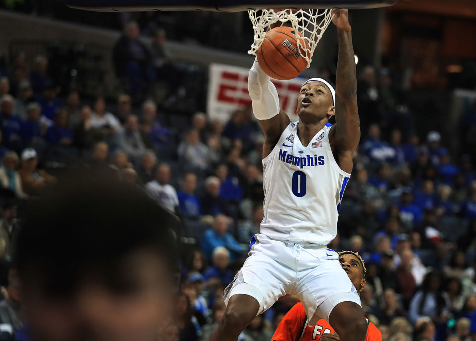 <strong>University of Memphis forward Kyvon Davenport (0) dunks against Florida A&amp;M during the Tigers game against the Rattlers at the FedExForum on Dec. 29, 2018.</strong> (Jim Weber/Daily Memphian)