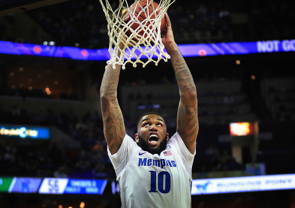 <strong>University of Memphis forward Mike Parks Jr. (10) dunks on a break-away against Florida A&amp;M during the Tigers game against the Rattlers at the FedExForum on Dec. 29, 2018.</strong> (Jim Weber/Daily Memphian)
