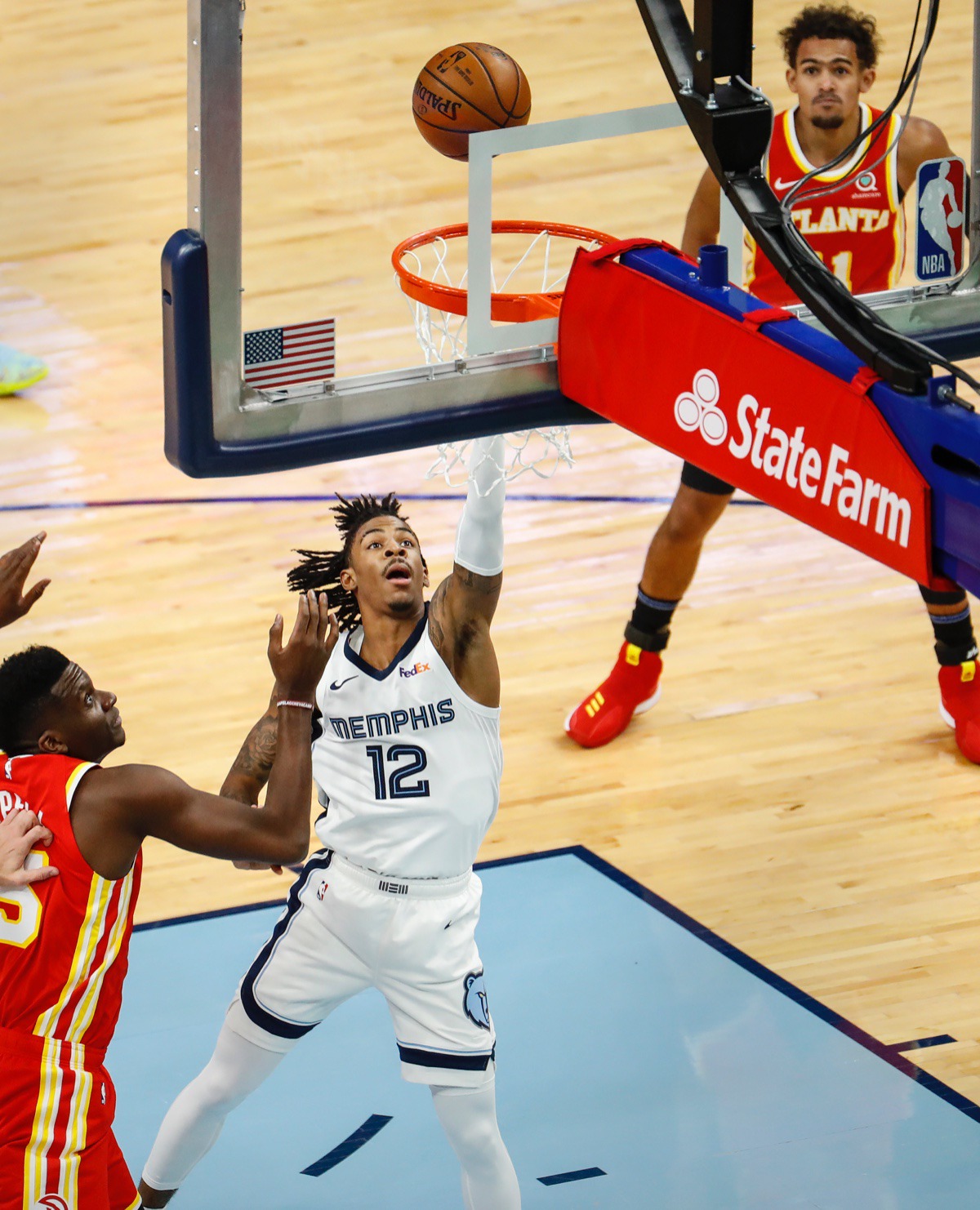 <strong>Memphis Grizzlies guard Ja Morant (middle) drives the lane against Atlanta on Thursday, Dec. 17, 2020.</strong> (Mark Weber/The Daily Memphian)