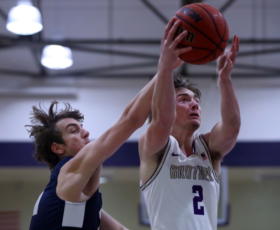 <strong>CBHS guard Eli Federman (2) goes for a layup during the Dec. 18, 2020, home game against Pope John Paul II.</strong> (Patrick Lantrip/Daily Memphian)