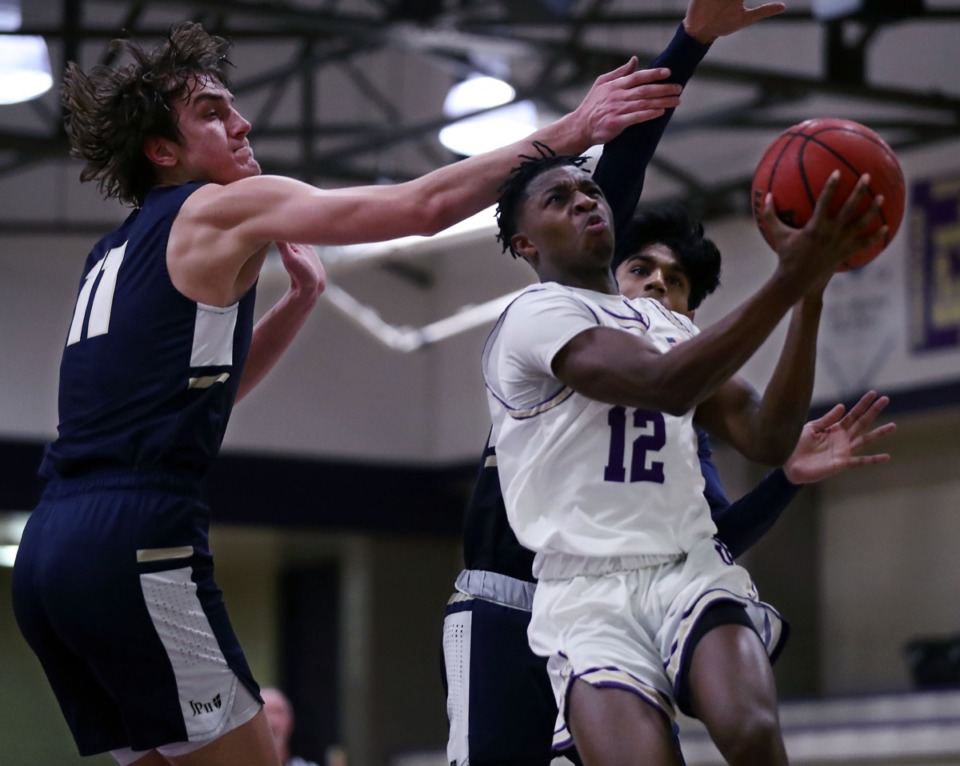 <strong>CBHS guard Zion Owens (12) shoots during the Dec. 18, 2020, home game against Pope John Paul II.</strong> (Patrick Lantrip/Daily Memphian)