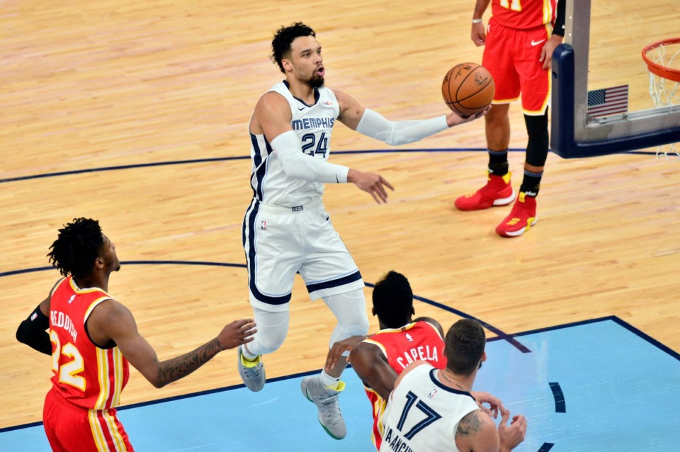 <strong>Memphis Grizzlies guard Dillon Brooks (24) shoots ahead of Atlanta Hawks forward Cam Reddish (22) in the first half of an NBA preseason basketball game Saturday, Dec. 19, 2020, at FedExForum.</strong> (Brandon Dill/AP)