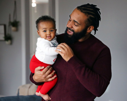 <strong>“Our lives at this point are kind of centered around this area,” said Marlon Ross, holding daughter Marlie.</strong> (Patrick Lantrip/Daily Memphian)