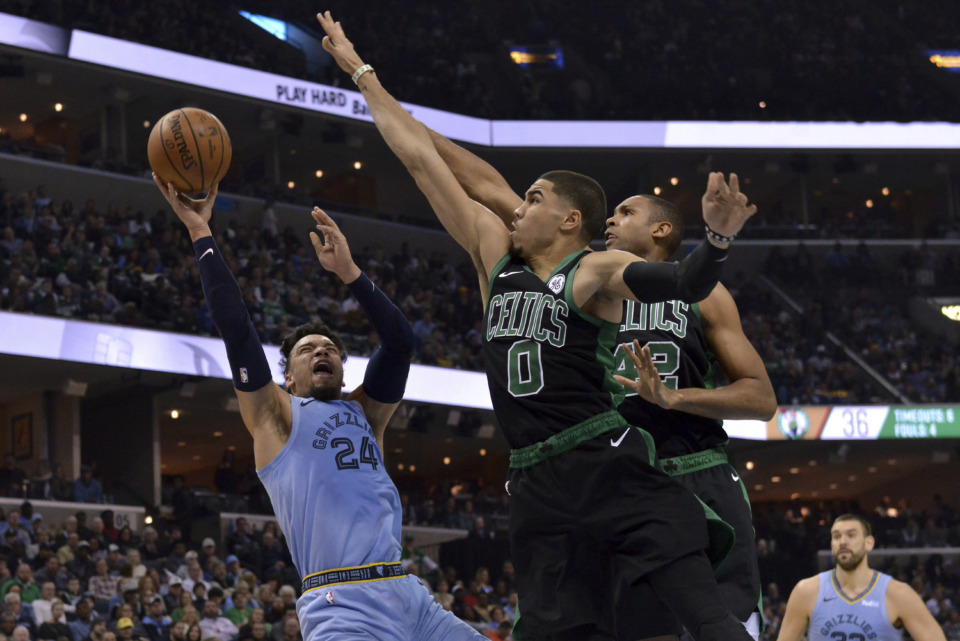 <strong>Memphis Grizzlies guard Dillon Brooks (24) shoots against Boston Celtics forward Jayson Tatum (0) and center Al Horford (42) during the first half of an NBA game Saturday, Dec. 29, 2018, in Memphis.</strong> (AP Photo/Brandon Dill)